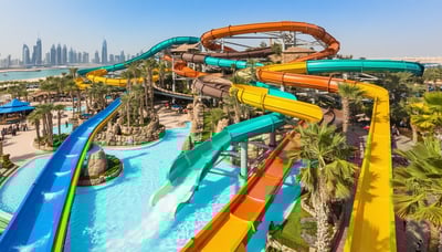 Aerial view of Aquaventure World Dubai waterpark with slides and pools Aerial view of Aquaventure World Dubai waterpark with slides and pools